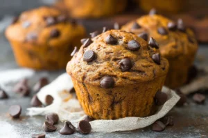 Bakery Style Pumpkin Muffins Loaded with Chocolate Chips